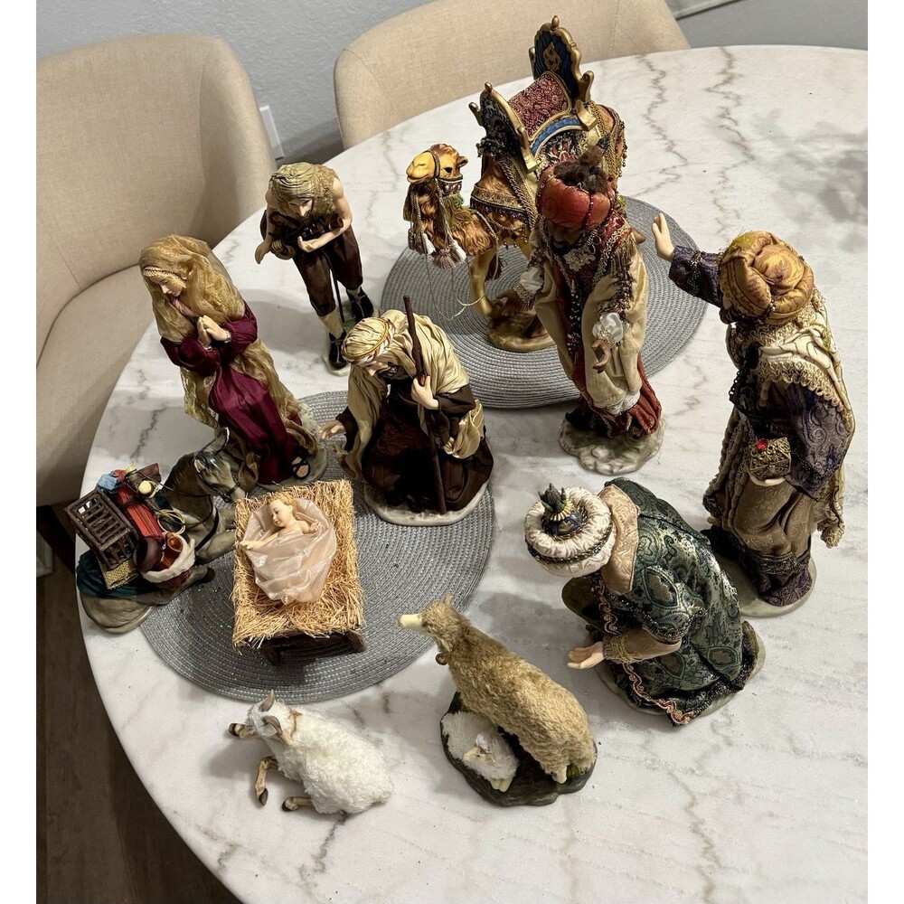 Up for saleVintage 11-Piece Hand-Painted Fabric-Draped Nativity Set (Missing Ox)